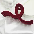 Detailed view of the luxurious burgundy velvet texture on a large curved hair claw clip - 13 Curved Streamer Style / Burgundy