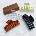 Large hair claw clip set featuring cream, transparent, amber, and black finishes. - 4 Pieces/Pack / 9CM Keel Style - 4 Colors