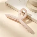 Detailed view of an elegant 13cm large pink PC hair claw clip for thick hair styling - Glossy Jelly Pink