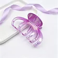 Detail shot of large purple gradient hair claw clip with glossy UV plated finish - UV Electroplated Gradient Rose Red