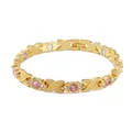 Close-up of gold-plated women's magnetic therapy bracelet with pink rhinestones - Pink Rhinestone / Gold