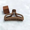 Close-up of matte brown hair claw clip with elegant curved design for hair styling - Yuanbao Style (14) / 9.5cm Size / Light Coffee