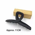 Matte black geometric hair claw clip detail showing the 11cm length and sleek design - Matte Black 11cm Ribbon