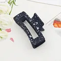 Detail of square hair claw clip with stylish black and white ink splatter pattern - Cube Style / 8.5cm Size / Speckled Black