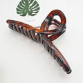 Detailed close-up showing the glossy tortoiseshell texture of the large hair claw clip - Ribbon Style (17) / 13cm Version / Red Tortoise Shell Color