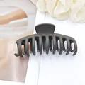 Detail view of large matte dark grey hair claw clip on a minimalist white background - Dark Coffee