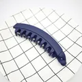 Detailed view of a navy blue matte banana hair clip for high ponytail on grid plate - Matte Navy Blue