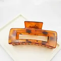 Detailed macro view of large tortoiseshell leopard print plastic hair claw shark clip - Square Style / 10.5cm / Red Leopard