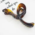 Large amber tortoiseshell hair claw clip with a minimalist matte finish for women. - Twisted Ribbon Style (5) / 13.5cm / Brown Tortoiseshell