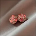 Close-up of elegant pink rhinestone ball earrings on a luxury brown satin background. - 1 Pair / Gold Pink Stone