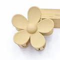 Close-up of a matte beige five-petal flower hair claw clip on a white background - Khaki