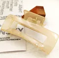 Close-up of translucent beige PC square hair claw clip with spring detail - Square Style (12*) / 10.5cm / Champagne
