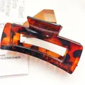 Close-up detail of a large tortoiseshell square hair claw clip for women's fashion hair. - Square Style (12*) / 10.5cm / Glossy Red Tortoise Shell
