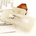 Detailed close-up of a large cream square hair claw clip made from durable PC material - Square Style (12*) / 10.5cm / Transparent White