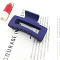 Detail view of a matte navy blue square hair claw clip showing texture and design. - Navy Blue / 8.5cm