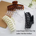 Large hair claw clip assortment featuring tortoise, clear, cream, and black styles. - 4 Pieces/Pack / 11CM Keel Style - 4 Colors