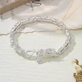 Close-up detail of a silver retro dragon head bracelet featuring an intricate braided link chain - Dragon Pattern Pendant Style / Silver