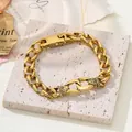 Close-up of vintage gold hip-hop bracelet with intricate dragon totem carvings - Totem Engraved Style / Gold