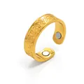 Detailed macro view of gold retro magnetic ring with engraved patterns and magnets - Gold