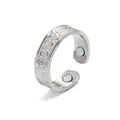 Detail view of vintage silver magnetic therapy ring with embossed celtic patterns. - Silver