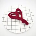 Detailed macro view of a wine red flocked velvet heart-shaped hair claw clip for women - Heart Style / 12cm / Burgundy