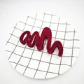 Macro view of wine red velvet wavy hair claw clip showing soft plush texture and zigzag shape - Wave Style / 11cm / Burgundy