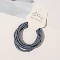 Macro view of minimalist high elastic Morandi blue thin hair tie on display card - 10 Pieces/Pack / Denim Blue