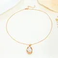 Elegant vintage gold chain necklace with a unique baroque pearl pendant for women. - Chain Necklace / Gold