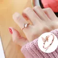 Exquisite macro detail of a rose gold frosted butterfly ring with a minimalist band - 5 / Frosted Butterfly (3106) / Rose Gold