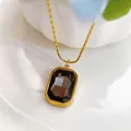 Minimalist stainless steel gold necklace featuring a rectangular smoky brown gemstone pendant - Black Necklace (86350) / Black