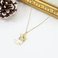 Macro view of gold-plated Christmas stocking pendant featuring sparkling crystal details. - White Stocking Style (3)