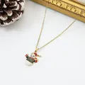 Close-up of a festive Christmas snowman pendant necklace with gold plating and enamel finish - Snowman Style(6)