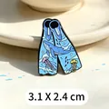 Detailed view of diving flipper enamel pin with whale illustration, size 3.1 x 2.4 cm. - Diving Flippers