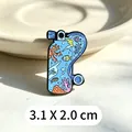 Detailed macro view of a diving tank enamel pin featuring colorful marine life - Scuba Diving Tank