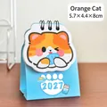 Adorable cartoon orange cat 2027 mini desk calendar for students, size 5.7x4.4x8cm - Orange Cat / 5.7x4.4x8cm