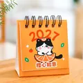 Cute 2027 mini desktop calendar featuring a cartoon cat and orange illustration for decor - Orange Good Luck / 6.5x3.8x7.5cm