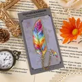 Elegant rainbow metal feather bookmark with golden chain on vintage card - Phantom Feather