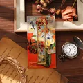 Elegant gold hollow metal bookmark featuring Van Gogh floral art card and butterfly - Clustered Blossoms