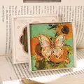 Exquisite hollow metal butterfly bookmark in a gift box with a delicate gold chain. - Gift Box / 1 Piece / Graceful Butterfly Dance