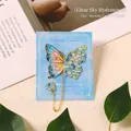 Elegant metal butterfly bookmark featuring hydrangea flower wing and delicate gold chain - 1 Piece / Blue (Blue Hydrangea)