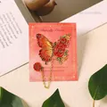 Exquisite butterfly metal bookmark with red enamel roses and golden chain decoration - 1 Piece / Red (Burning Rose)