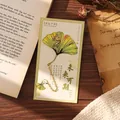 Ginkgo leaf shaped metal bookmark with golden plating and chain on decorative backing card - Gradient Ginkgo (Bright Future)