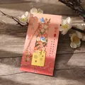 Elegant gilded metal bookmark with plum blossom and bird design on red card - Lucky Birds & Flowers
