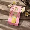 Elegant gold-plated metal bookmark featuring a pink hibiscus flower and crane enamel design - Heron & Lotus