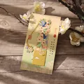 Elegant gold-plated metal swallow and cherry blossom bookmark on a decorative gift card - Spring Swallow & Apricot