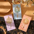 Elegant hollowed-out floral metal bookmark set with Chinese character charms and tassels - Wishes True + Prosperous Future + Good Luck (W891)
