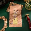 Elegant vintage gold metal butterfly bookmark with floral engraving on wood-grain card. - Leisurely Butterfly Dance / 1 Piece