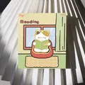 Cute cartoon cat metal bookmark reading a book presented on a colorful decorative card - Reading Cat / 1 Piece
