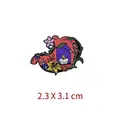 Macro detail view of an artistic floral stomach enamel pin showing 2.3 x 3.1 cm dimensions - Stomach Style 02