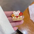Close-up of a cute cartoon bear enamel pin with 'Flowers of the Motherland' text. - Polar Bear (Flower of Nation) / White